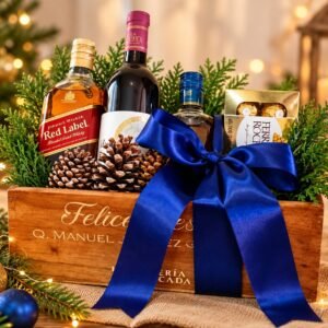 Obsequio empresarial navideño en caja de madera con vino y moño azul